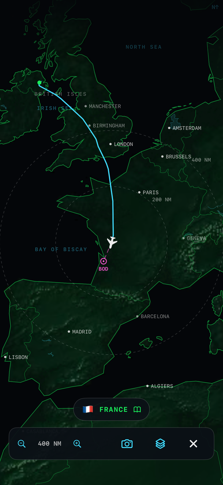 Fullscreen map of a real Belfast to Bordeaux flight: the whole track drawn, France chip below and the map camera button